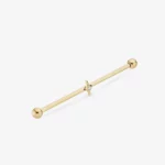 Piercing typu industrial z motywem gwiazdy